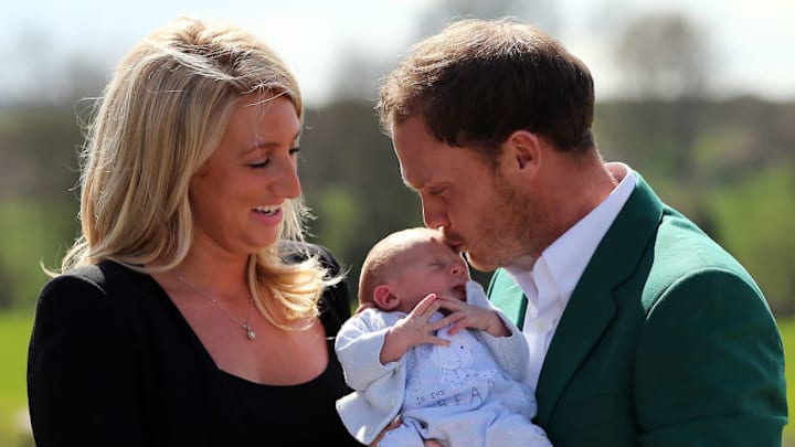 WORKSOP, ENGLAND - APRIL 13: Masters champion Danny Willett poses for photographs wearing the famous green jacket with wife Nicole and son Zachariah at Lindrick Golf Club on April 13, 2016 in Worksop, England. Danny Willett is the first Briton in 20 years to win the US Masters. (Photo by Nigel Roddis/Getty Images)