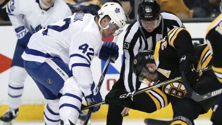 BOSTON, MA - APRIL 14: Toronto Maple Leafs center Tyler Bozak (42) and Boston Bruins center Patrice Bergeron (37) face off during Game 2 of the First Round for the 2018 Stanley Cup Playoffs between the Boston Bruins and the Toronto Maple Leafs on April 14, 2018, at TD Garden in Boston, Massachusetts. The Bruins defeated the Maple Leafs 7-3. (Photo by Fred Kfoury III/Icon Sportswire via Getty Images)