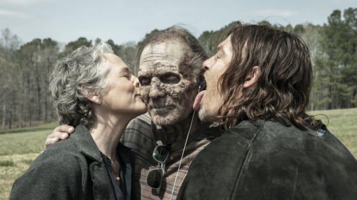 BTS, Melissa McBride as Carol Peletier, Executive Producer Greg Nicotero, Norman Reedus as Daryl Dixon - The Walking Dead _ Season 11, Episode 24 - Photo Credit: Jace Downs/AMC