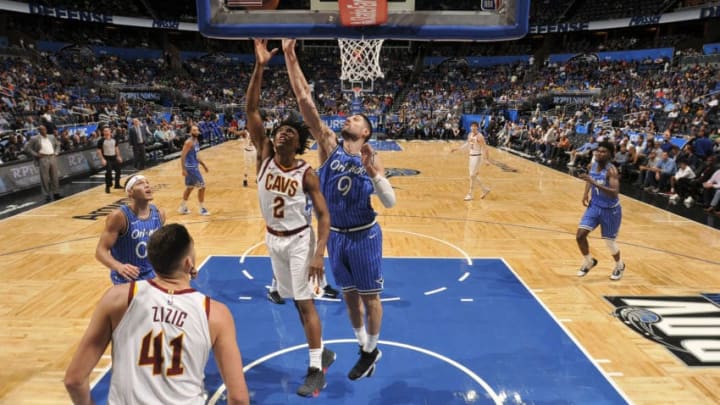 ORLANDO, FL - MARCH 14: Collin Sexton #2 of the Cleveland Cavaliers puts up the shot over Nikola Vucevic #9 of the Orlando Magic on March 14, 2019 at Amway Center in Orlando, Florida. NOTE TO USER: User expressly acknowledges and agrees that, by downloading and or using this photograph, User is consenting to the terms and conditions of the Getty Images License Agreement. Mandatory Copyright Notice: Copyright 2019 NBAE (Photo by Fernando Medina/NBAE via Getty Images)