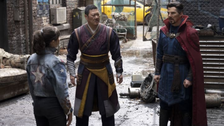 Xochitl Gomez as America Chavez, Benedict Wong as Wong, and Benedict Cumberbatch as Doctor Strange/Stephen Strange in Marvel Studios' DOCTOR STRANGE IN THE MULTIVERSE OF MADNESS. Photo by Jay Maidment. ©Marvel Studios 2022. All Rights Reserved.