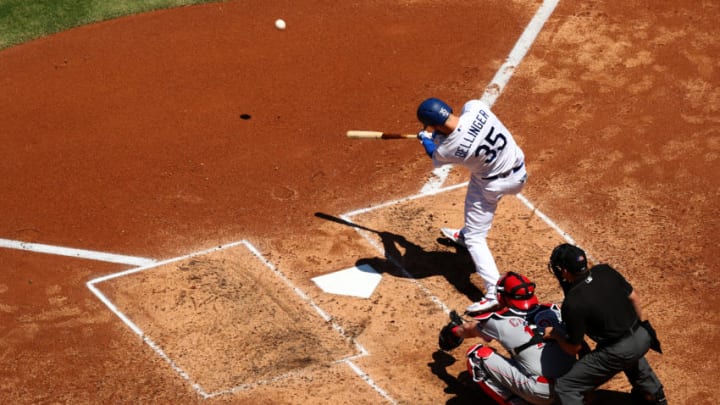 LOS ANGELES, CALIFORNIA - APRIL 17: Cody Bellinger #35 of the Los Angeles Dodgers hits a single against the Cincinnati Reds during the fourth inning at Dodger Stadium on April 17, 2019 in Los Angeles, California. (Photo by Yong Teck Lim/Getty Images)