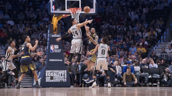 DENVER, CO - FEBRUARY 13: Danny Green #14 of the San Antonio Spurs defends Wilson Chandler #21 of the Denver Nuggets at Pepsi Center on February 13, 2018 in Denver, Colorado. NOTE TO USER: User expressly acknowledges and agrees that, by downloading and or using this photograph, User is consenting to the terms and conditions of the Getty Images License Agreement. (Photo by Jamie Schwaberow/Getty Images)