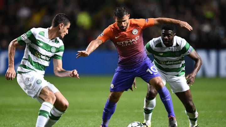 Manchester City's Argentinian striker Sergio Aguero (C) vies with Celtic's Israeli midfielder Nir Bitton (L) during the UEFA Champions League Group C football match between Celtic and Manchester City at Celtic Park stadium in Glasgow, Scotland on September 28, 2016. / AFP / OLI SCARFF (Photo credit should read OLI SCARFF/AFP/Getty Images)