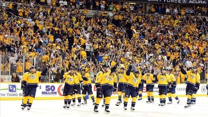May 2, 2012; Nashville, TN, USA; Nashville Predators team members raise their sticks in victory after a game against the Phoenix Coyotes after game three in the Western Conference semifinals of the 2012 Stanley Cup Playoffs at Bridgestone Arena. The Predators beat the Coyotes 2-0. Don McPeak-USA TODAY Sports