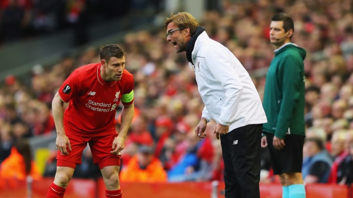 LIVERPOOL, UNITED KINGDOM – MAY 05: Jurgen Klopp manager of Liverpool gives instructions to captain James Milner of Liverpool during the UEFA Europa League semi final second leg match between Liverpool and Villarreal CF at Anfield on May 5, 2016 in Liverpool, England. (Photo by Richard Heathcote/Getty Images)