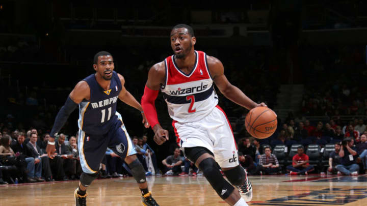 Washington Wizards John Wall and Memphis Grizzlies Mike Conley (Photo by Ned Dishman/NBAE via Getty Images)