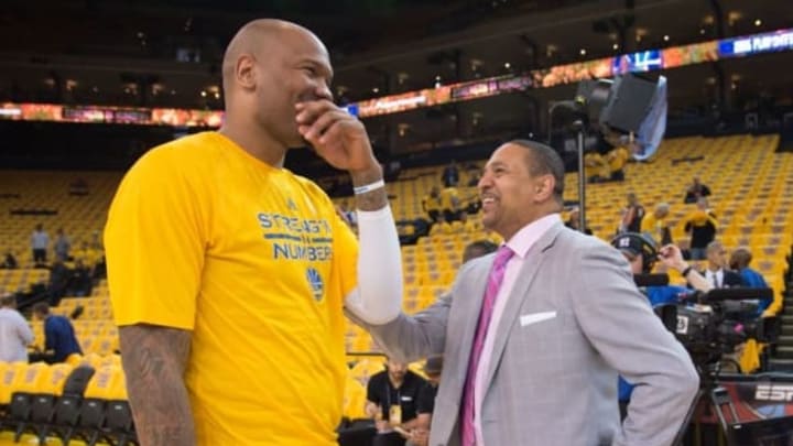 May 19, 2015; Oakland, CA, USA; Golden State Warriors center Marreese Speights (5, left) talks to ESPN broadcaster Mark Jackson (right) before game one of the Western Conference Finals of the NBA Playoffs against the Houston Rockets at Oracle Arena. Mandatory Credit: Kyle Terada-USA TODAY Sports