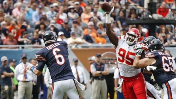 Aug 27, 2016; Chicago, IL, USA; Kansas City Chiefs defensive tackle Chris Jones (95) blocks a pass by Chicago Bears quarterback Jay Cutler (6) during the first half of the preseason game at Soldier Field. Mandatory Credit: Kamil Krzaczynski-USA TODAY Sports