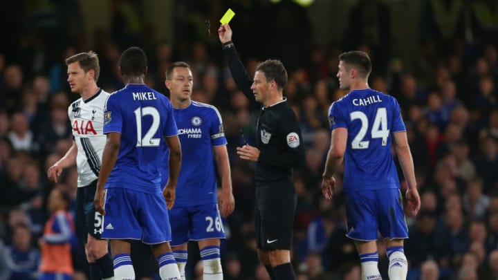 LONDON, ENGLAND - MAY 02 : Referee Mark Clattenburg shows a yellow card during the Barclays Premier League match between Chelsea and Tottenham Hotspur at Stamford Bridge on May 2, 2016 in London, England. (Photo by Catherine Ivill - AMA/Getty Images)