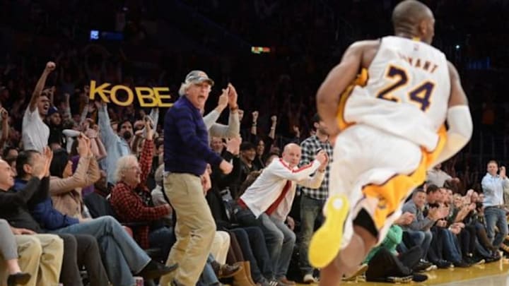 Nov 30, 2014; Los Angeles, CA, USA; The crowd cheers as Los Angeles Lakers guard Kobe Bryant (24) heads down court in the second half of the game against the Toronto Raptors at Staples Center. Lakers won 129-122 in overtime. Mandatory Credit: Jayne Kamin-Oncea-USA TODAY Sports