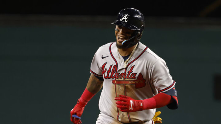 ARLINGTON, TX - MAY 15: Orlando Arcia #11 of the Atlanta Braves celebrates his two run home run against the Texas Rangers during the sixth inning at Globe Life Field on May 15, 2023 in Arlington, Texas. The Braves won 12-0. (Photo by Ron Jenkins/Getty Images)