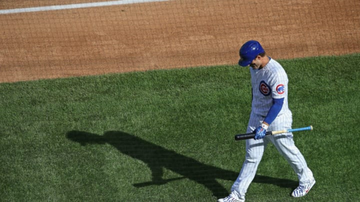 CHICAGO, ILLINOIS - OCTOBER 02: Anthony Rizzo #44 of the Chicago Cubs walks back to the dugout after striking out against the Miami Marlins during Game Two of the National League Wild Card Series at Wrigley Field on October 02, 2020 in Chicago, Illinois. (Photo by Jonathan Daniel/Getty Images)