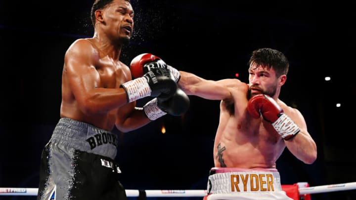 LONDON, ENGLAND - FEBRUARY 12: John Ryder punches Daniel Jacobs during the super-middleweight fight between Daniel Jacobs and John Ryder at Alexandra Palace on February 12, 2022 in London, England. (Photo by Alex Davidson/Getty Images)