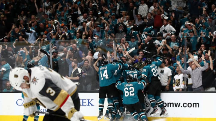 SAN JOSE, CALIFORNIA – APRIL 23: Barclay Goodrow #23 of the San Jose Sharks is congratulated by teammates as Brayden McNabb #3 of the Vegas Golden Knights skates off the ice after he scored the game winning goal in overtime in Game Seven of the Western Conference First Round during the 2019 NHL Stanley Cup Playoffs at SAP Center on April 23, 2019 in San Jose, California. (Photo by Ezra Shaw/Getty Images)