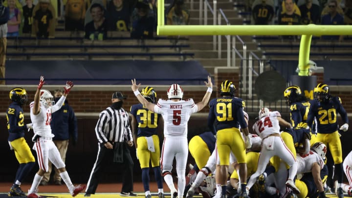 ANN ARBOR, MICHIGAN – NOVEMBER 14: Graham Mertz #5 of the Wisconsin Badgers celebrates a first-half touchdown against the Michigan Wolverines at Michigan Stadium on November 14, 2020, in Ann Arbor, Michigan. (Photo by Gregory Shamus/Getty Images)