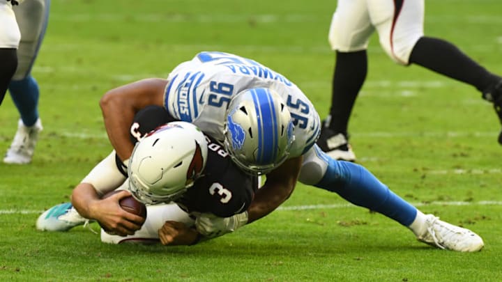 GLENDALE, ARIZONA - DECEMBER 09: Romeo Okwara #95 of the Detroit Lions sacks Josh Rosen #3 of the Arizona Cardinals at State Farm Stadium on December 09, 2018 in Glendale, Arizona. (Photo by Norm Hall/Getty Images)