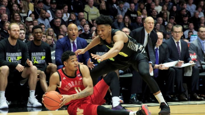 WEST LAFAYETTE, INDIANA - FEBRUARY 09: Dachon Burke Jr. #11 of the Nebraska Cornhuskers looks to pass the ball while being guarded by Nojel Eastern #20 of the Purdue Boilermakers during the first half at Mackey Arena on February 09, 2019 in West Lafayette, Indiana. (Photo by Justin Casterline/Getty Images)
