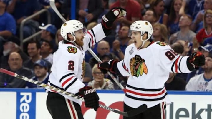 Jun 3, 2015; Tampa, FL, USA; Chicago Blackhawks left wing Teuvo Teravainen (86) celebrates with defenseman Duncan Keith (2) after scoring a goal against the Tampa Bay Lightning in the third period in game one of the 2015 Stanley Cup Final at Amalie Arena. Mandatory Credit: Kim Klement-USA TODAY Sports