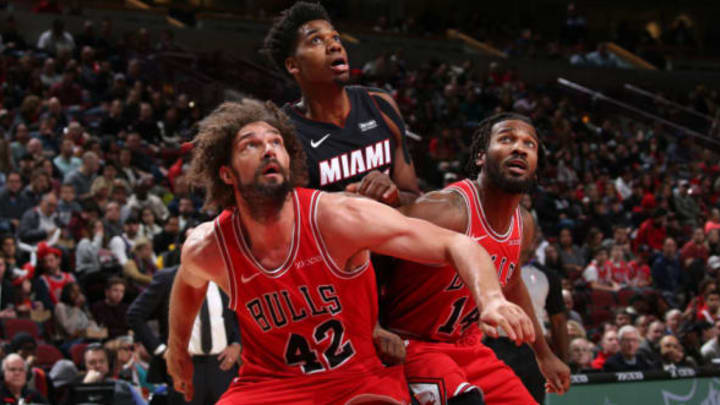 CHICAGO, IL – JANUARY 19: Robin Lopez #42 of the Chicago Bulls and Hassan Whiteside #21 of the Miami Heat look to grab the rebound on January 19, 2019 at the United Center in Chicago, Illinois. NOTE TO USER: User expressly acknowledges and agrees that, by downloading and or using this photograph, user is consenting to the terms and conditions of the Getty Images License Agreement. Mandatory Copyright Notice: Copyright 2019 NBAE (Photo by Gary Dineen/NBAE via Getty Images)