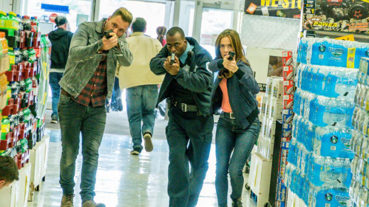CHICAGO P.D.-- "No Regrets" Episode 706 -- Pictured: (l-r) Patrick John Flueger as Officer Adam Ruzek, Marina Squerciati as Officer Kim Burgess -- (Photo by: Matt Dinerstein/NBC)