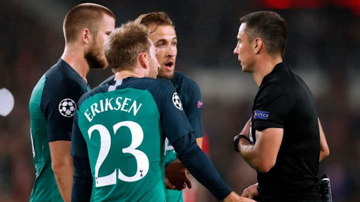 EINDHOVEN, NETHERLANDS - OCTOBER 24: (L-R) Christian Eriksen of Tottenham Hotspur, Eric Dier of Tottenham Hotspur, Harry Kane of Tottenham Hotspur, referee Slavko Vincic during the UEFA Champions League match between PSV v Tottenham Hotspur at the Philips Stadium on October 24, 2018 in Eindhoven Netherlands (Photo by Edwin van Zandvoort/Soccrates/Getty Images)