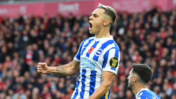 Brighton's Belgian midfielder Leandro Trossard celebrates after scoring their second goal during the English Premier League football match between Liverpool and Brighton and Hove Albion at Anfield in Liverpool, north west England on October 30, 2021. - - RESTRICTED TO EDITORIAL USE. No use with unauthorized audio, video, data, fixture lists, club/league logos or 'live' services. Online in-match use limited to 120 images. An additional 40 images may be used in extra time. No video emulation. Social media in-match use limited to 120 images. An additional 40 images may be used in extra time. No use in betting publications, games or single club/league/player publications. (Photo by Paul ELLIS / AFP) / RESTRICTED TO EDITORIAL USE. No use with unauthorized audio, video, data, fixture lists, club/league logos or 'live' services. Online in-match use limited to 120 images. An additional 40 images may be used in extra time. No video emulation. Social media in-match use limited to 120 images. An additional 40 images may be used in extra time. No use in betting publications, games or single club/league/player publications. / RESTRICTED TO EDITORIAL USE. No use with unauthorized audio, video, data, fixture lists, club/league logos or 'live' services. Online in-match use limited to 120 images. An additional 40 images may be used in extra time. No video emulation. Social media in-match use limited to 120 images. An additional 40 images may be used in extra time. No use in betting publications, games or single club/league/player publications. (Photo by PAUL ELLIS/AFP via Getty Images)