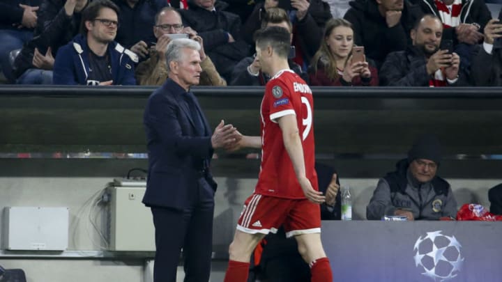 MUNICH, GERMANY - APRIL 11: Coach of Bayern Munich Jupp Heynckes greets Robert Lewandowski after he's replaced during the UEFA Champions League Quarter Final second leg match between Bayern Muenchen and FC Sevilla at Allianz Arena on April 11, 2018 in Munich, Germany. (Photo by Jean Catuffe/Getty Images)