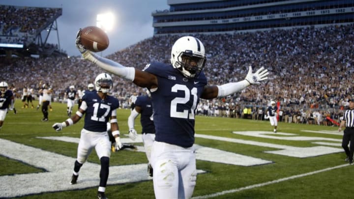 STATE COLLEGE, PA - SEPTEMBER 01: Amani Oruwariye #21 of the Penn State Nittany Lions celebrates after intercepting a pass in overtime to clinch the win against the Appalachian State Mountaineers on September 1, 2018 at Beaver Stadium in State College, Pennsylvania. (Photo by Justin K. Aller/Getty Images)