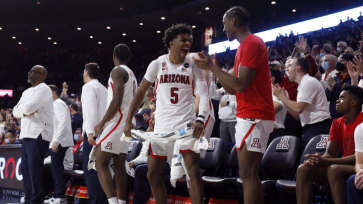Feb 3, 2022; Tucson, Arizona, USA; Arizona Wildcats guard Justin Kier (5) reacts on the bench after a basket during the second half against the UCLA Bruins at McKale Center. Mandatory Credit: Chris Coduto-USA TODAY Sports