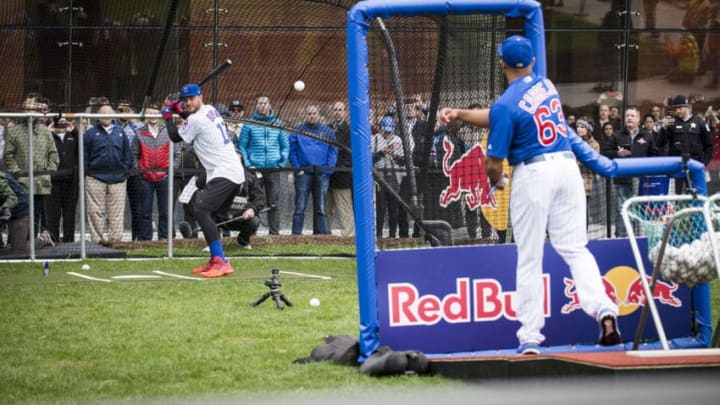 Kris Bryant does some batting practice in the streets of Downtown Chicago, IL, USA on 11 April 2017.