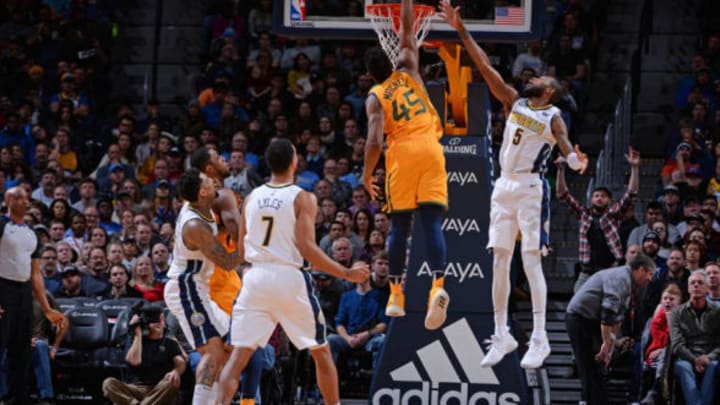 DENVER, CO – DECEMBER 26: Donovan Mitchell #45 of the Utah Jazz dunks the ball around Will Barton #5 of the Denver Nuggets against the Denver Nuggets on December 26, 2017 at the Pepsi Center in Denver, Colorado. NOTE TO USER: User expressly acknowledges and agrees that, by downloading and/or using this photograph, user is consenting to the terms and conditions of the Getty Images License Agreement. Mandatory Copyright Notice: Copyright 2017 NBAE (Photo by Bart Young/NBAE via Getty Images)