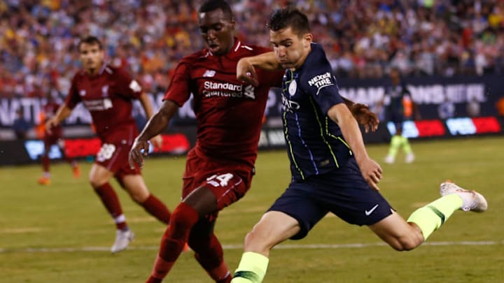 EAST RUTHERFORD, NJ - JULY 25: Benjamin Garre #73 of Manchester City fights for the ball with Rafael Camacho #64 of Liverpool during their match at MetLife Stadium on July 25, 2018 in East Rutherford, New Jersey. (Photo by Jeff Zelevansky/Getty Images)