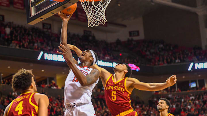 LUBBOCK, TX - JANUARY 16: Tariq Owens #11 of the Texas Tech Red Raiders gets the layup against Lindell Wigginton #5 of the Iowa State Cyclones during the second half of the game on January 16, 2019 at United Supermarkets Arena in Lubbock, Texas. Iowa State defeated Texas Tech 68-64. (Photo by John Weast/Getty Images)