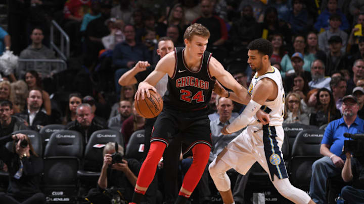 DENVER, CO - NOVEMBER 30: Lauri Markkanen #24 of the Chicago Bulls handles the ball against the Denver Nuggets on November 30, 2017 at the Pepsi Center in Denver, Colorado. NOTE TO USER: User expressly acknowledges and agrees that, by downloading and/or using this Photograph, user is consenting to the terms and conditions of the Getty Images License Agreement. Mandatory Copyright Notice: Copyright 2017 NBAE (Photo by Garrett Ellwood/NBAE via Getty Images)