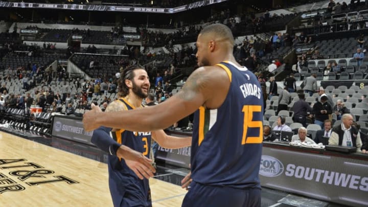 SAN ANTONIO, TX - FEBRUARY 3: Ricky Rubio #3 and Derrick Favors #15 of the Utah Jazz share a hug after the game against the San Antonio Spurs on February 3, 2018 at the AT&T Center in San Antonio, Texas. NOTE TO USER: User expressly acknowledges and agrees that, by downloading and or using this photograph, user is consenting to the terms and conditions of the Getty Images License Agreement. Mandatory Copyright Notice: Copyright 2018 NBAE (Photos by Mark Sobhani/NBAE via Getty Images)