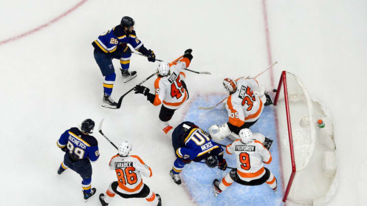 Mar 24, 2022; St. Louis, Missouri, USA; St. Louis Blues left wing Nathan Walker (26) shoots against Philadelphia Flyers goaltender Martin Jones (35) during the third period at Enterprise Center. Mandatory Credit: Jeff Curry-USA TODAY Sports