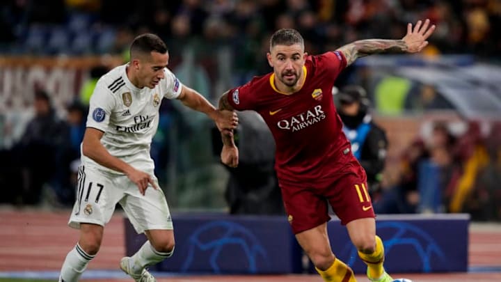 ROME, ITALY - NOVEMBER 27: Lucas Vazquez of Real Madrid, Aleksandar Kolarov of AS Roma during the UEFA Champions League match between AS Roma v Real Madrid at the Stadio Olimpico Rome on November 27, 2018 in Rome Italy (Photo by David S. Bustamante/Soccrates/Getty Images)