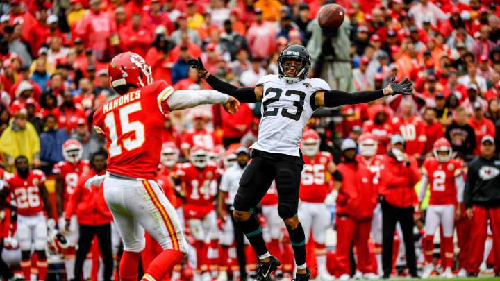 KANSAS CITY, MO – OCTOBER 7: Tyler Patmon #23 of the Jacksonville Jaguars leaps in the air to try and deflect the pass attempt of Patrick Mahomes #15 of the Kansas City Chiefs during the second quarter of the game at Arrowhead Stadium on October 7, 2018 in Kansas City, Missouri. (Photo by Peter Aiken/Getty Images)