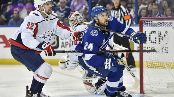 TAMPA, FL - MAY 19: Washington Capitals center Evgeny Kuznetsov (92) and Tampa Bay Lightning right wing Ryan Callahan (24) track the puck in the air during the first period of the fifth game of the NHL Stanley Cup Eastern Conference Final between the Washington Capitals and the Tampa Bay Lightning on May 19, 2018, at Amalie Arena in Tampa, FL. (Photo by Roy K. Miller/Icon Sportswire via Getty Images)