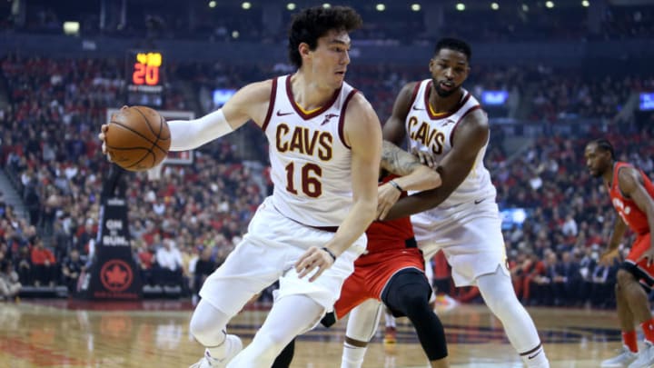 TORONTO, ON - OCTOBER 17: Cedi Osman #16 of the Cleveland Cavaliers dribbles the ball as Fred VanVleet #23 of the Toronto Raptors defends during the first half of the NBA season opener at Scotiabank Arena on October 17, 2018 in Toronto, Canada. NOTE TO USER: User expressly acknowledges and agrees that, by downloading and or using this photograph, User is consenting to the terms and conditions of the Getty Images License Agreement. (Photo by Vaughn Ridley/Getty Images)