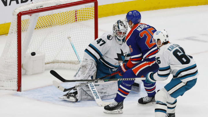 Edmonton Oilers defensemen Darnell Nurse (25) scores the overtime winning goal against San Jose Sharks goaltender James Reimer (47) Mandatory Credit: Perry Nelson-USA TODAY Sports