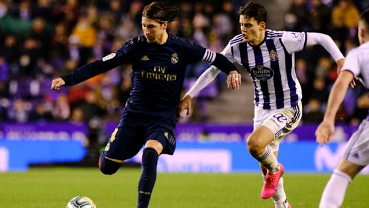 VALLADOLID, SPAIN - JANUARY 26: Sergio Ramos of Real Madrid CF fights for the ball with Enes Unal of Real Valladolid during the Liga match between Real Valladolid CF and Real Madrid CF at Jose Zorrilla on January 26, 2020 in Valladolid, Spain. (Photo by Xaume Olleros/Getty Images)