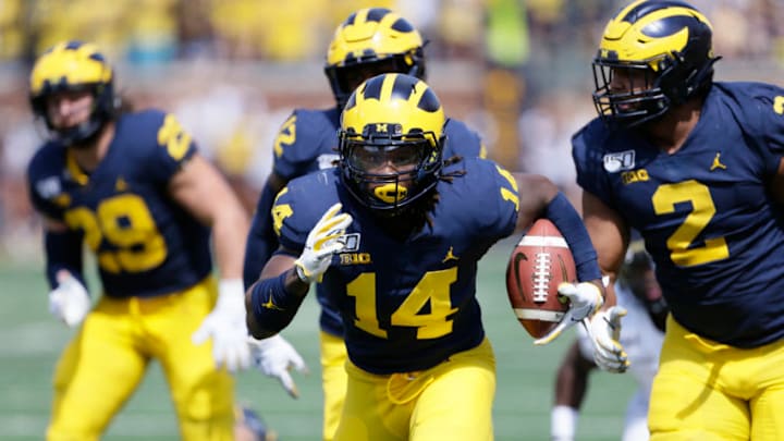 ANN ARBOR, MI - SEPTEMBER 7: Josh Metellus #14 of the Michigan Wolverines carries the ball against the Army Black Knights during the first half at Michigan Stadium on September 7, 2019 in Ann Arbor, Michigan. (Photo by Duane Burleson/Getty Images)