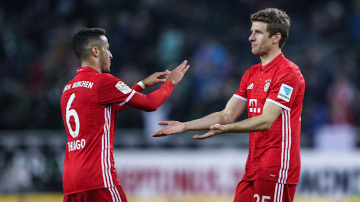 MOENCHENGLADBACH, GERMANY - MARCH 19: Thomas Mueller of Bayern and Thiago Alcantara do Nascimento of Bayern (L) react after the Bundesliga match between Borussia Moenchengladbach and Bayern Muenchen at Borussia-Park on March 18, 2017 in Moenchengladbach, Germany. (Photo by Maja Hitij/Bongarts/Getty Images)