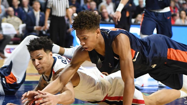 LAS VEGAS, NEVADA – MARCH 11: Brandon Clarke #15 of the Gonzaga Bulldogs and Kessler Edwards #15 of the Pepperdine Waves go after a loose ball during a semifinal game of the West Coast Conference basketball tournament at the Orleans Arena on March 11, 2019 in Las Vegas, Nevada. The Bulldogs defeated the Waves 100-74. (Photo by Ethan Miller/Getty Images)