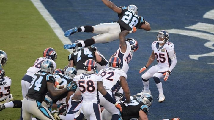 Feb 7, 2016; Santa Clara, CA, USA; Carolina Panthers running back Jonathan Stewart (28) dives over the pile for a touchdown in Super Bowl 50 at Levi