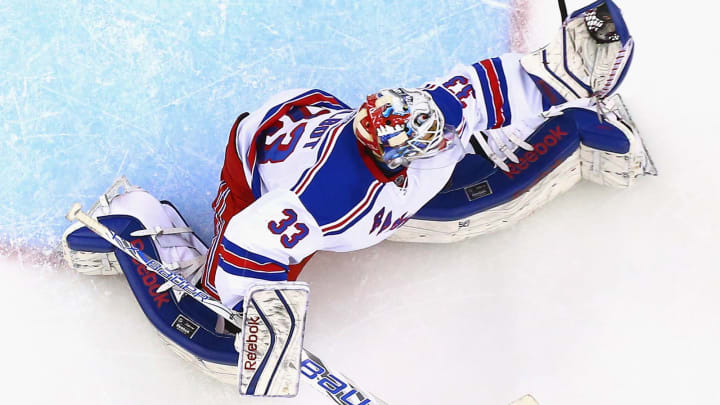 NEWARK, NJ – APRIL 07: Cam Talbot #33 of the New York Rangers makes a glove save against the New Jersey Devils during the game at the Prudential Center on April 7, 2015 in Newark, New Jersey. (Photo by Andy Marlin/NHLI via Getty Images)