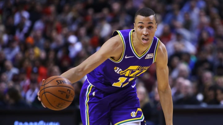 TORONTO, ON – JANUARY 1: Dante Exum #11 of the Utah Jazz dribbles the ball during the second half of an NBA game against the Toronto Raptors at Scotiabank Arena on January 1, 2019 in Toronto, Canada. NOTE TO USER: User expressly acknowledges and agrees that, by downloading and or using this photograph, User is consenting to the terms and conditions of the Getty Images License Agreement. (Photo by Vaughn Ridley/Getty Images)