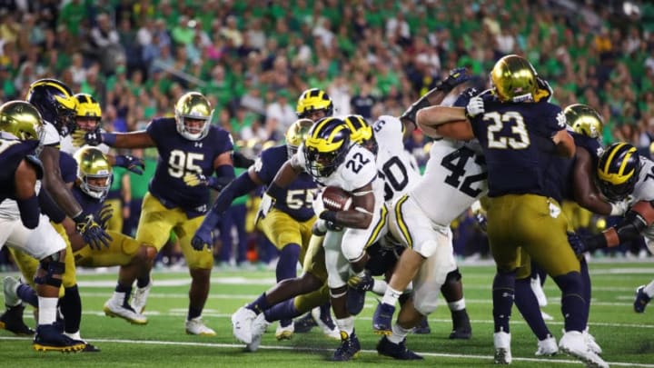 SOUTH BEND, IN - SEPTEMBER 01: Karan Higdon #22 of the Michigan Wolverines carries the ball against the Notre Dame Fighting Irish in the escond quarter at Notre Dame Stadium on September 1, 2018 in South Bend, Indiana. (Photo by Gregory Shamus/Getty Images)